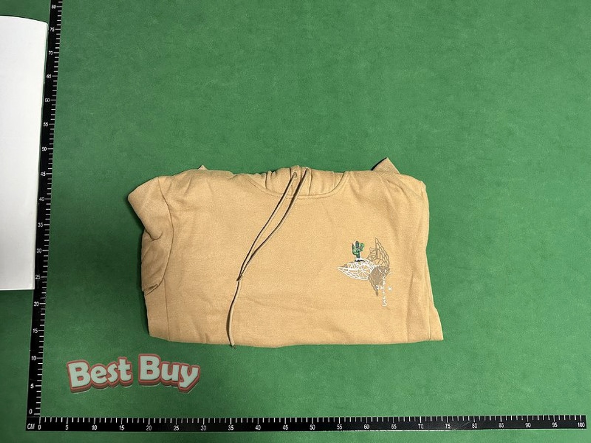 Folded clothing photos help plan parcel space and compression tolerance.