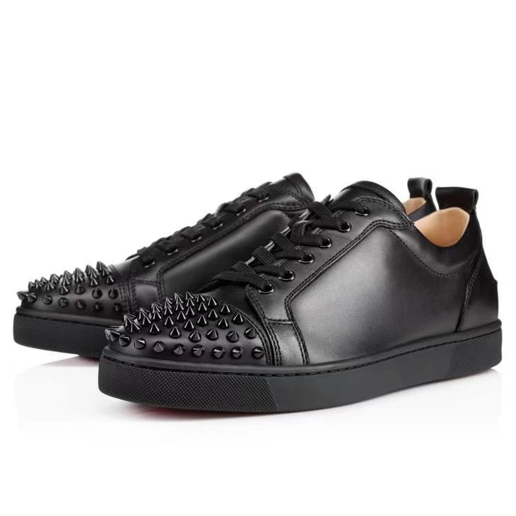 Black leather-toe rivets