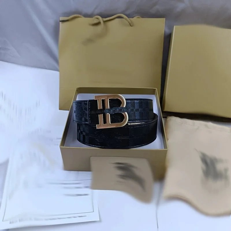 Embossed B gold buckle