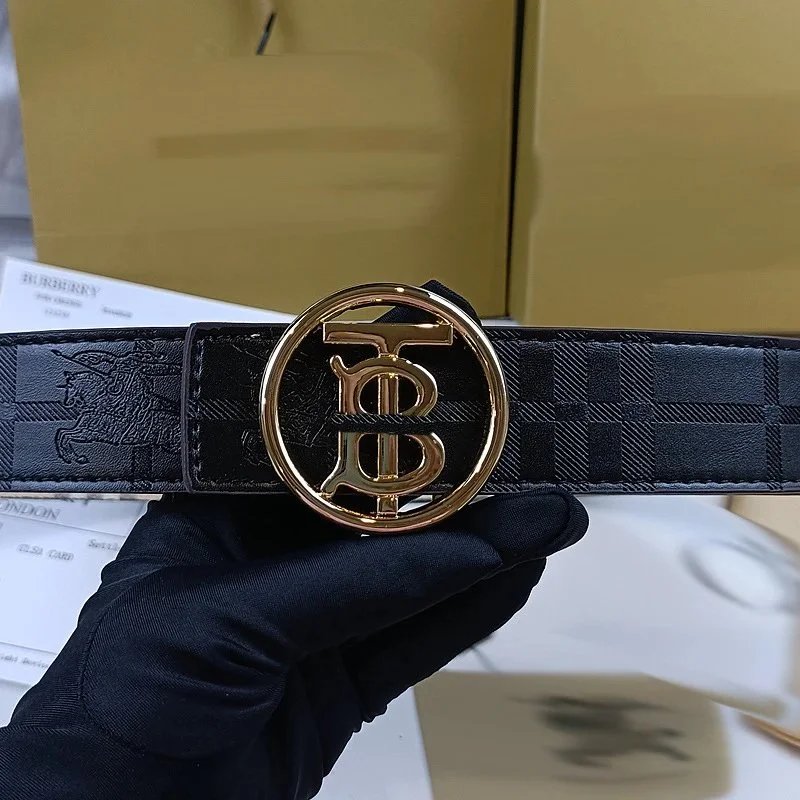 Embossed circle with TB gold buckle