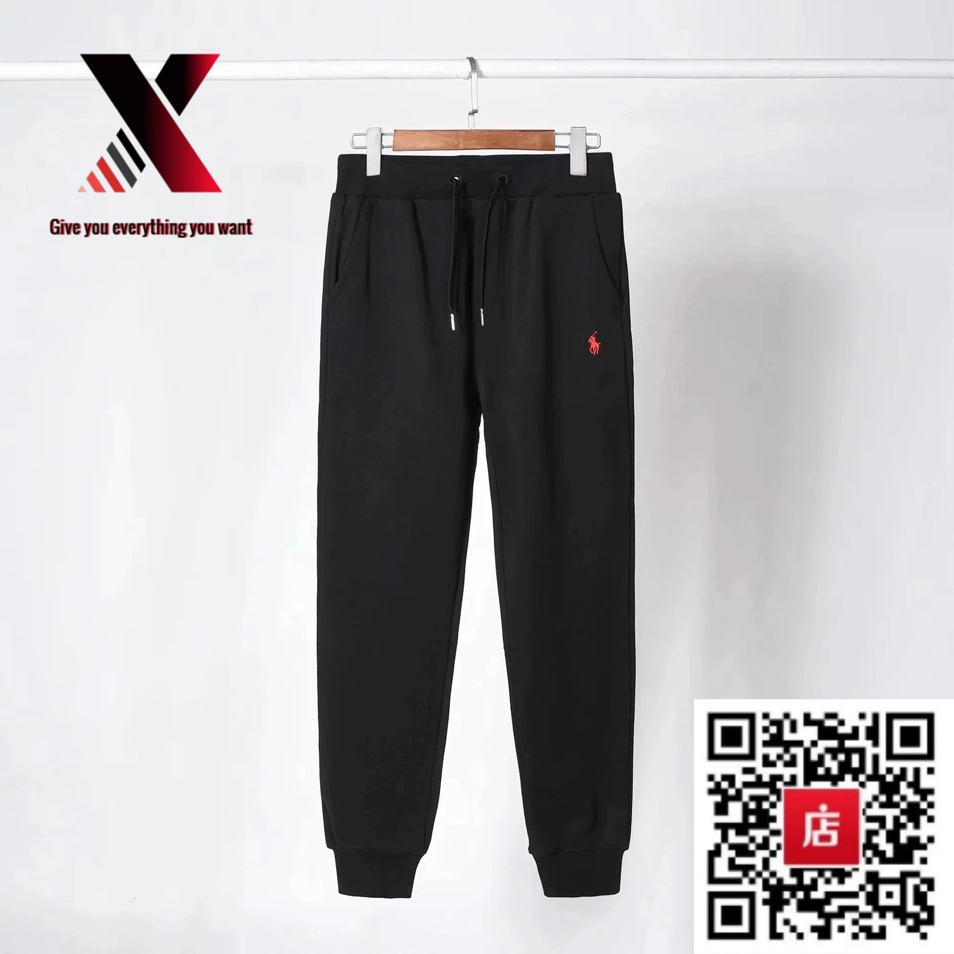 Black pants with a red label