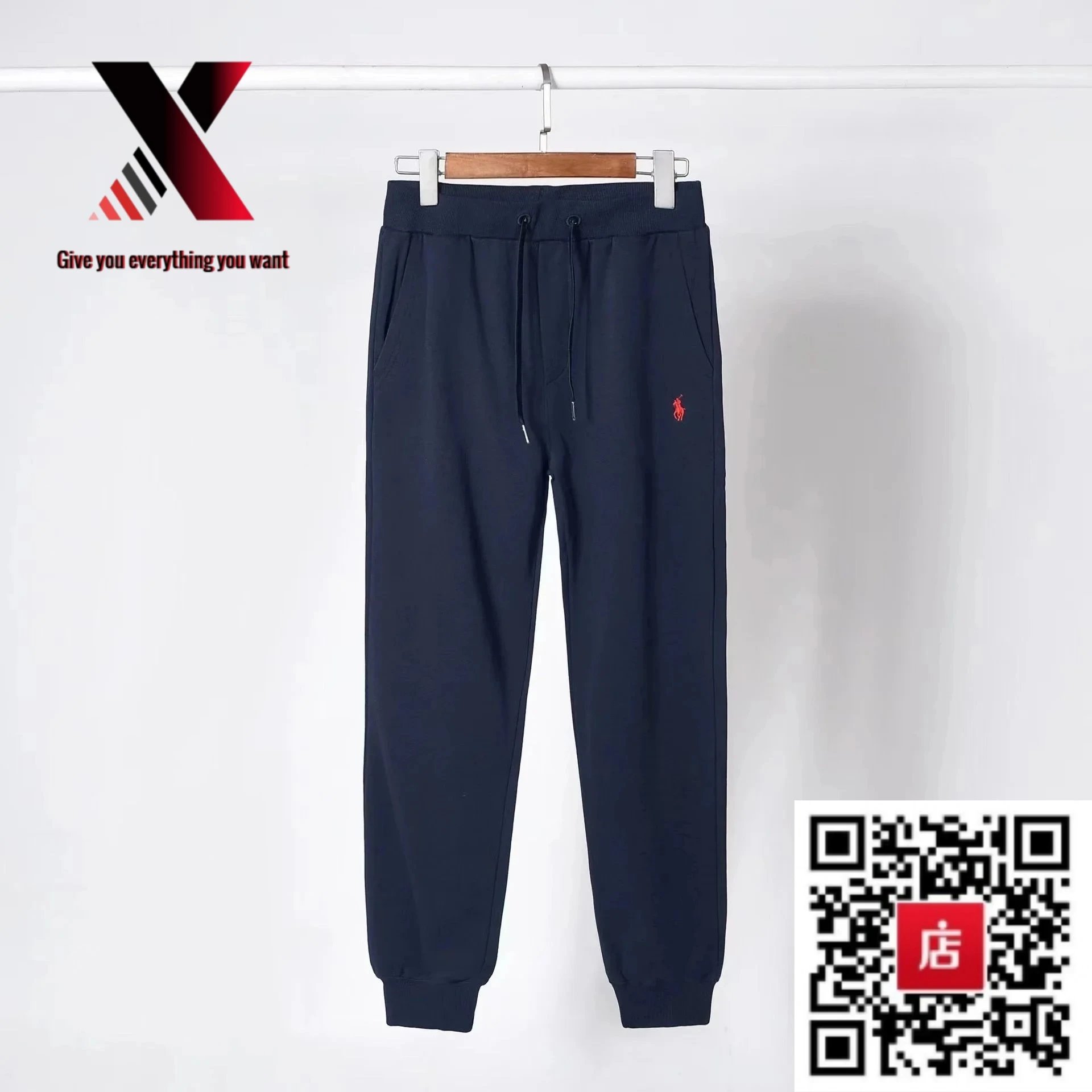 Cyan pants with a red label