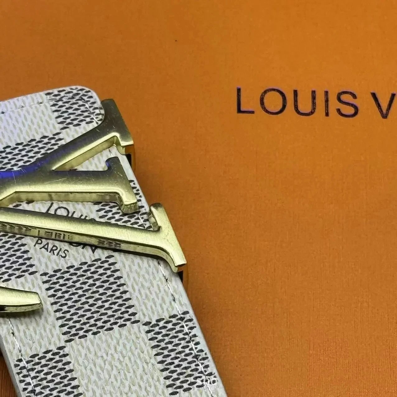 White lattice, gold buckle