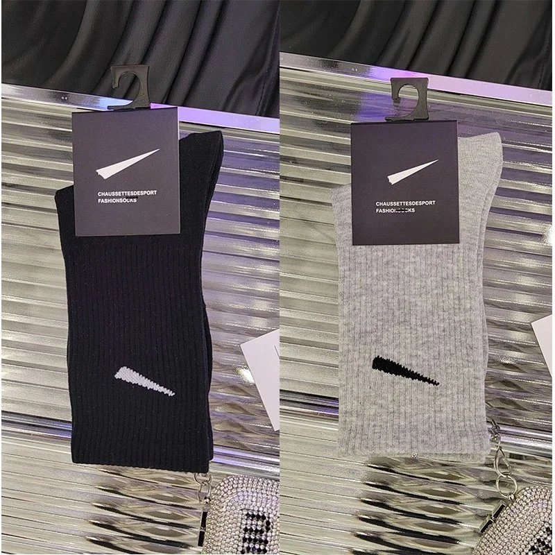 5 pairs of black knee-highs, 5 pairs of gray