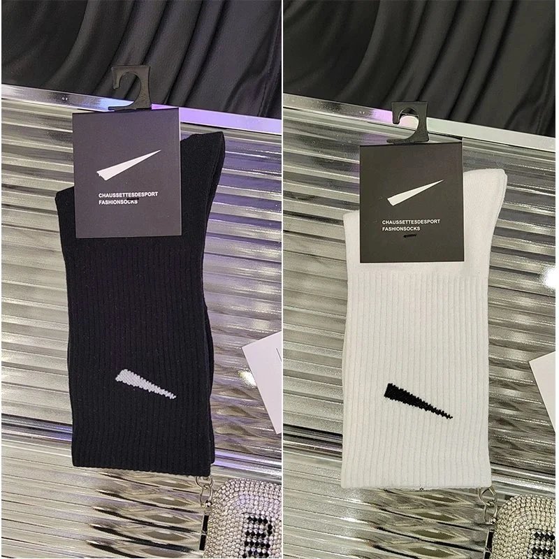 5 pairs of black knee-highs, 5 pairs of white knee-highs