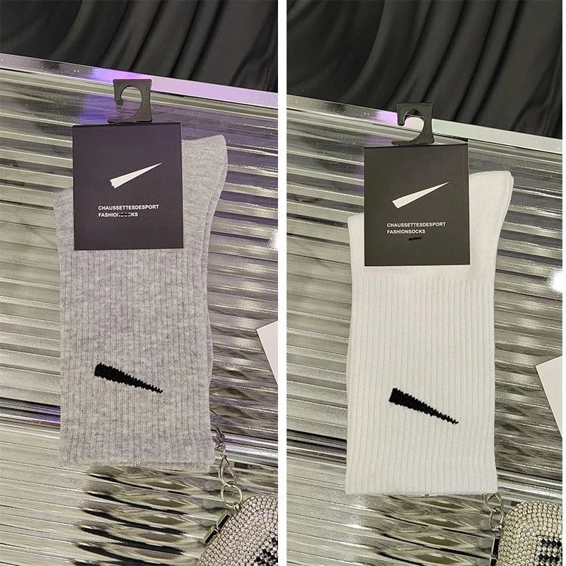 5 pairs of white knee-high socks, 5 pairs of gray