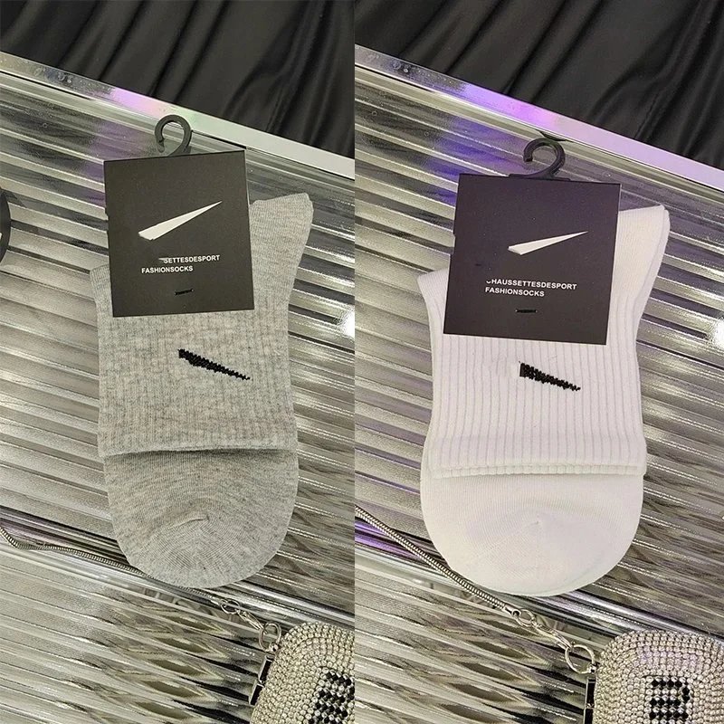 5 pairs of white mid-calf socks, 5 pairs of gray