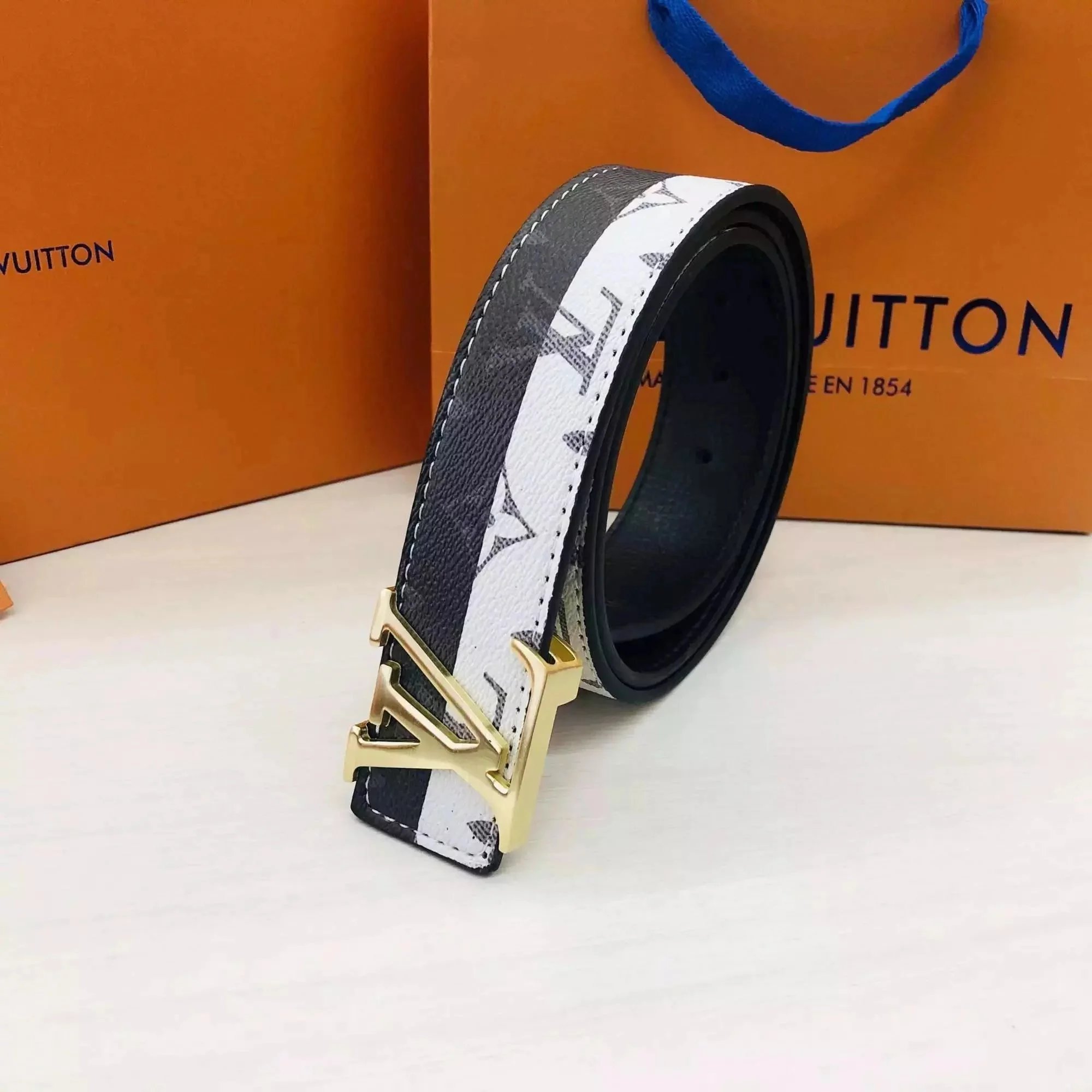 New black and white gold buckle