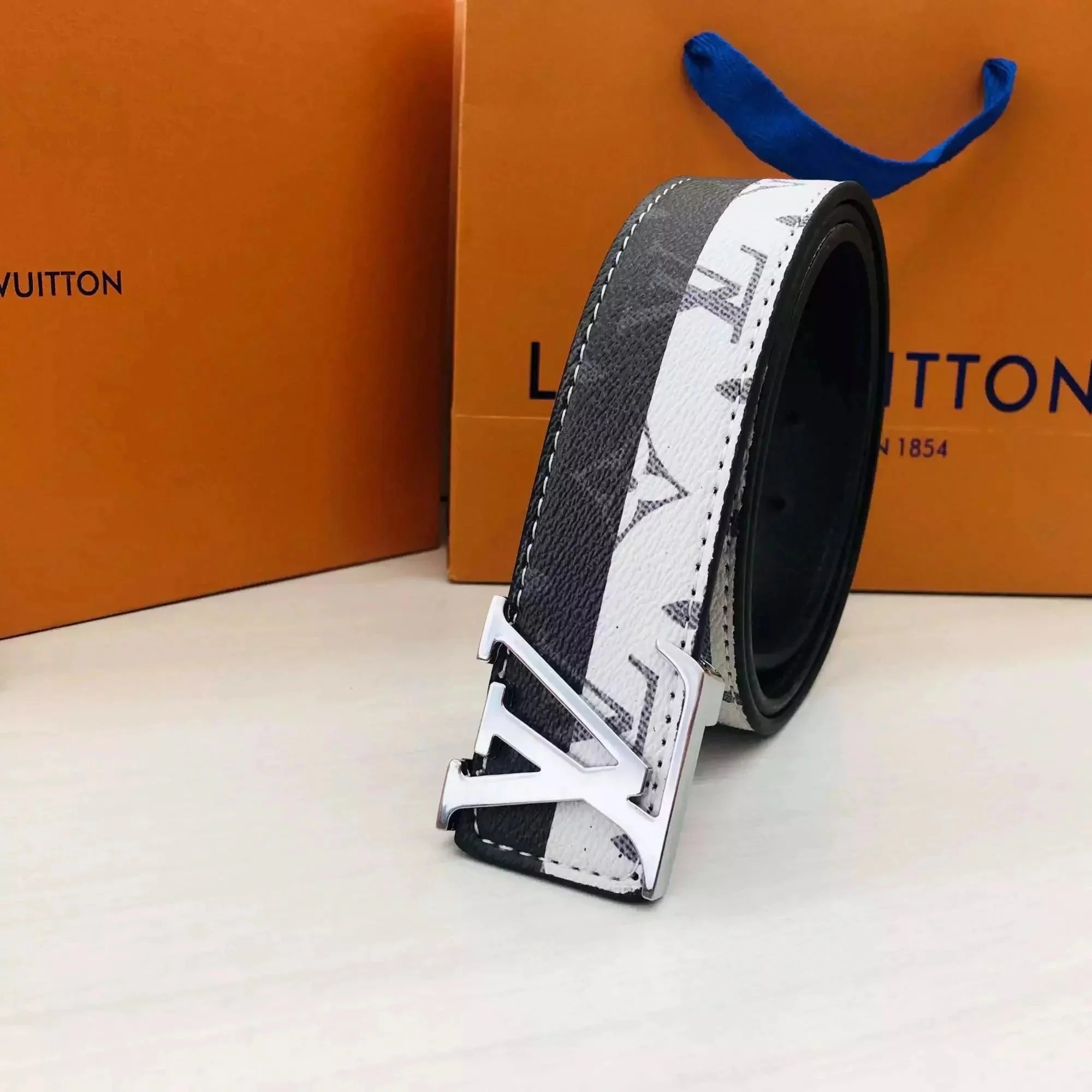 New black, silver, and white buckle