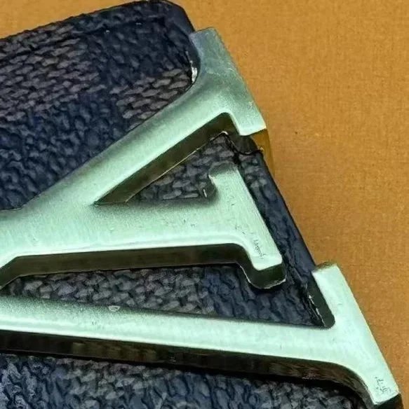 Cage gold buckle