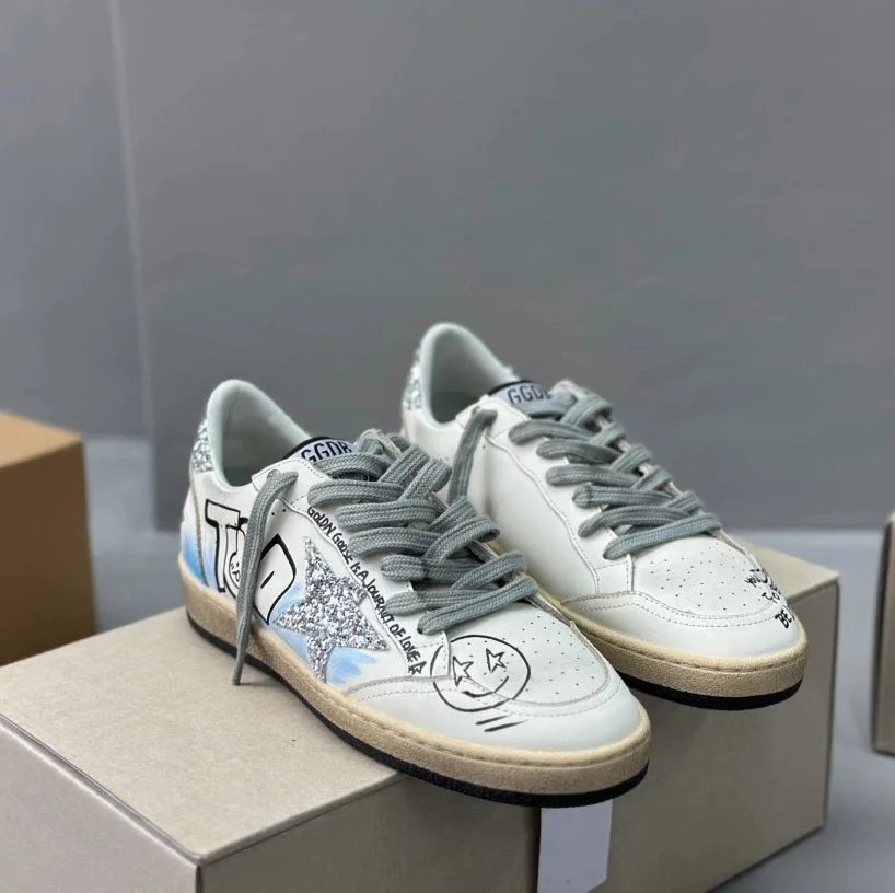 Hand-painted graffiti with silver tail