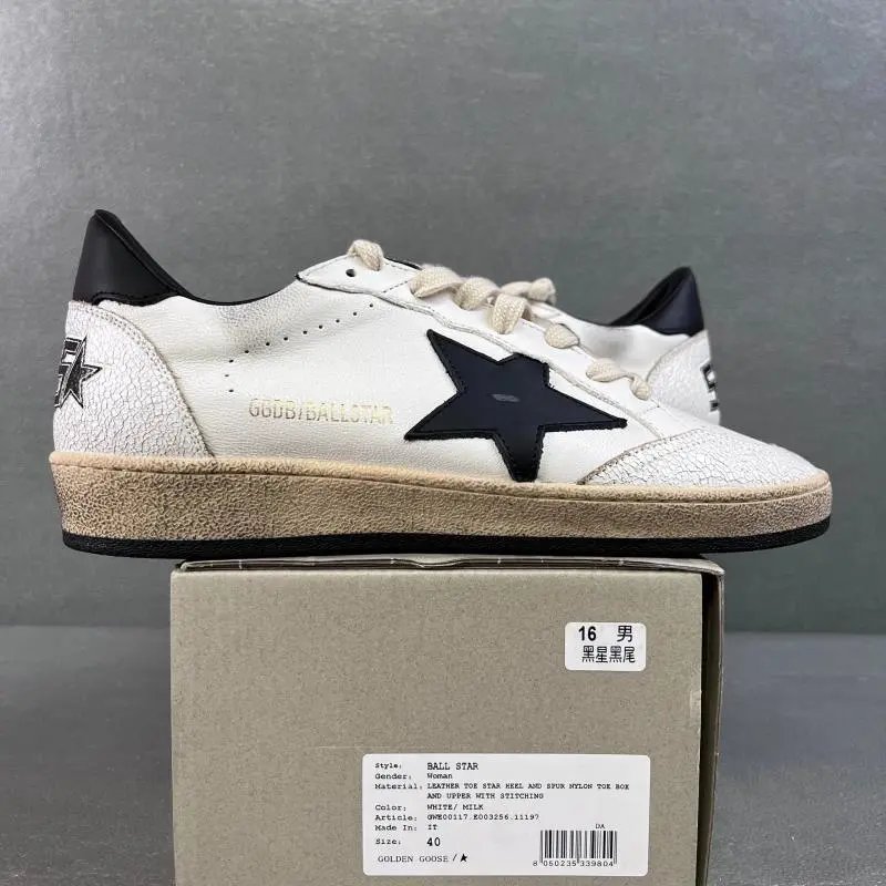 White leather, black star, black tail