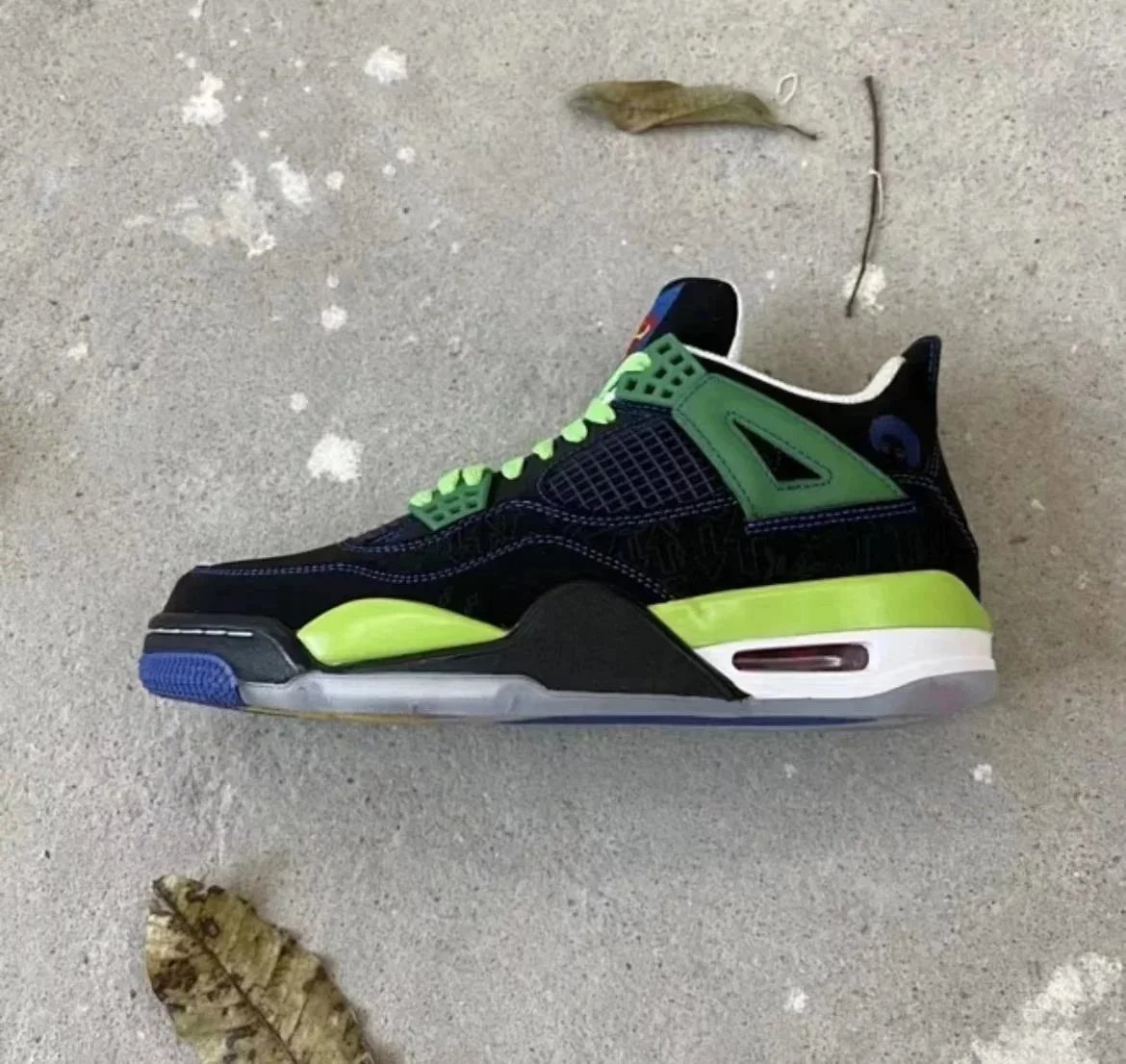 AJ4 Black and Green Charity 308497-015