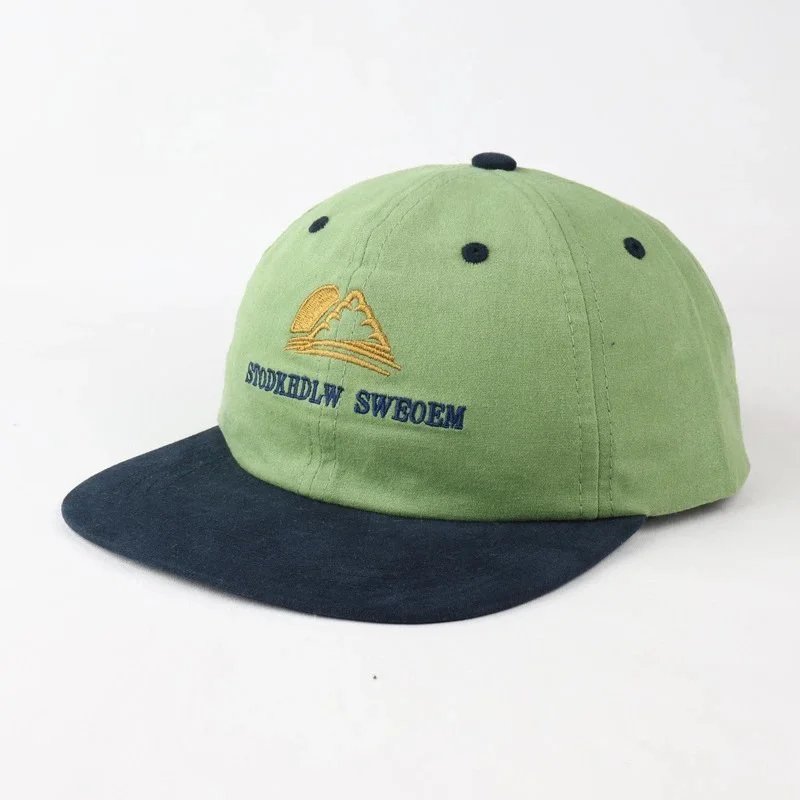 Color block triangle mountain flat cap green