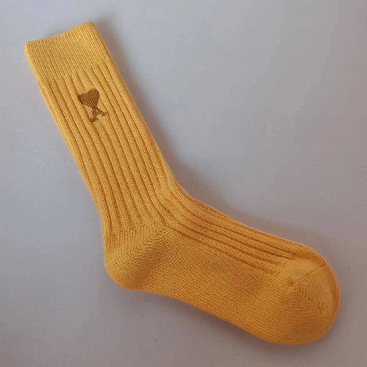 Yellow bold needle embroidery