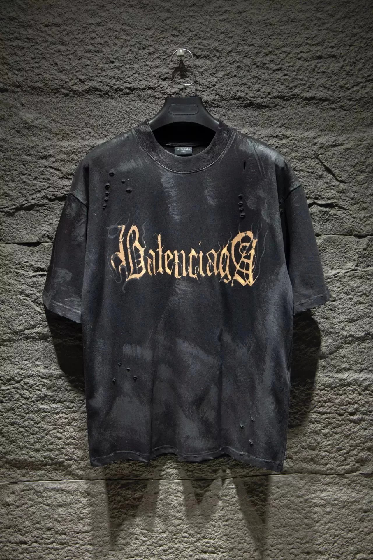 Gold lettering on a black background 002