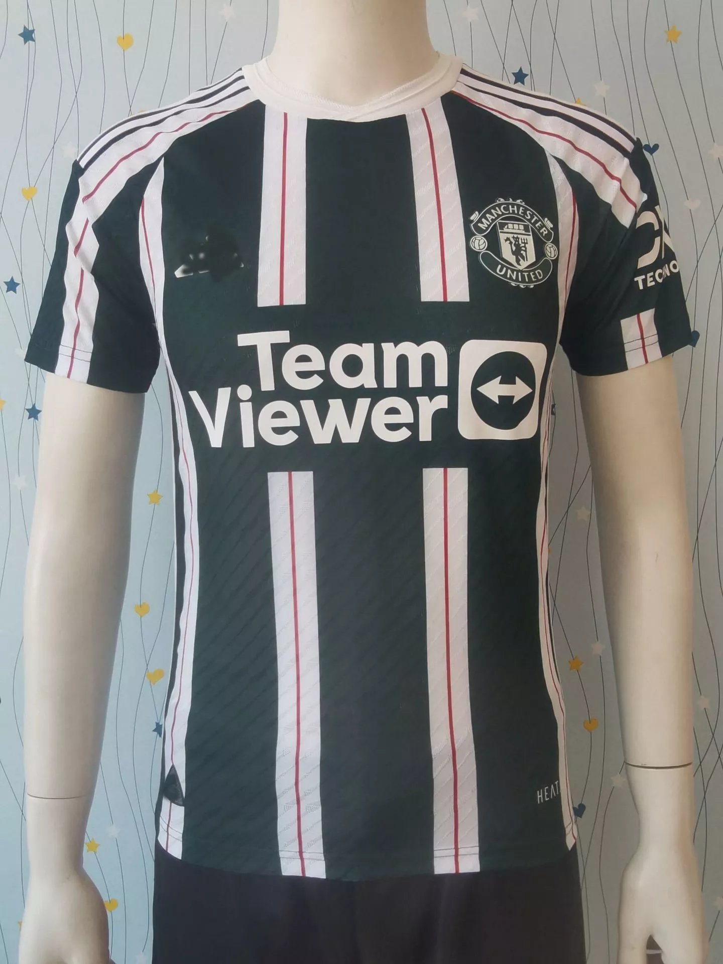 Manchester United away green and white