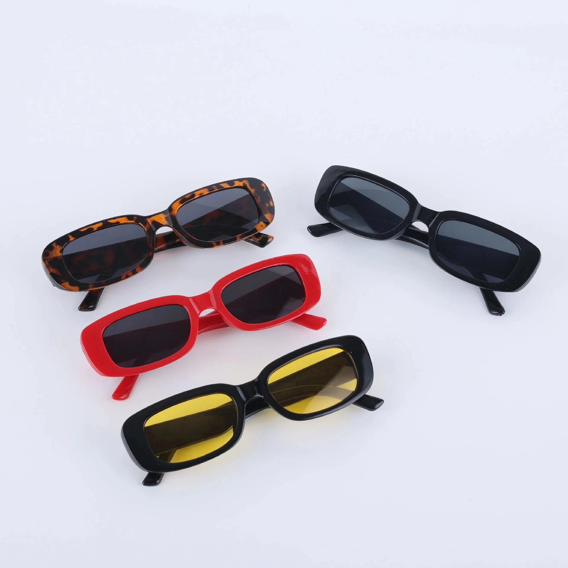 Leopard-print frame with gray lenses